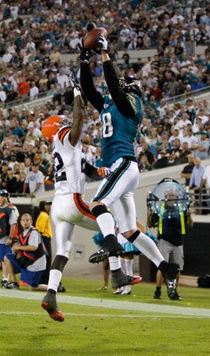 JACKSONVILLE, FL - OCTOBER 26:  Matt Jones #18 of the Jacksonville Jaguars attempts to make a reception against Brandon McDonald #22 of the Cleveland Browns in a game at Jacksonville Muncipal Stadium on October 26, 2008 in Jacksonville, Florida.  (Photo b