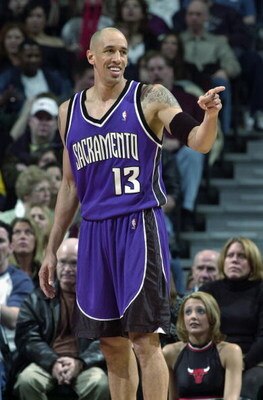 CHICAGO - MARCH 29:  Doug Christie #13 of the Sacramento Kings smiles during the game against the Chicago Bulls at the United Center on March 29, 2003 in Chicago, Illinois.  The Kings won 107-92.  NOTE TO USER: User expressly acknowledges and agrees that,