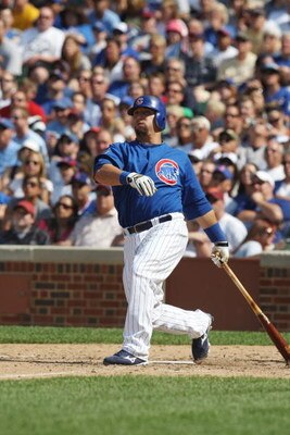 CHICAGO - JULY 03:  Jake Fox #5 of the Chicago Cubs at bat against the Milwaukee Brewers during their MLB game on July 3, 2009 at Wrigley Field in Chicago, Illinois. (Photo by Jonathan Daniel/Getty Images) 