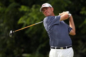BETHESDA, MD - JULY 03:  Davis Love III hits a shot during the second round of the AT&T National hosted by Tiger Woods at Congressional Country Club on July 3, 2009 in Bethesda, Maryland.  (Photo by Hunter Martin/Getty Images)