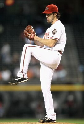 PHOENIX - APRIL 22:  Starting pitcher Dan Haren #15 of the Arizona Diamondbacks pitches against the Colorado Rockies during the game at Chase Field on April 22, 2009 in Phoenix, Arizona. The Diamondbacks defeated the Rockies 2-0.  (Photo by Christian Pete