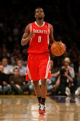 LOS ANGELES, CA - MAY 12:  Aaron Brooks #0 of the Houston Rockets moves the ball against the Los Angeles Lakers in Game Five of the Western Conference Semifinals during the 2009 NBA Playoffs at Staples Center on May 12, 2009 in Los Angeles, California. NO
