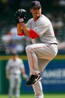 ARLINGTON, TX - APRIL 3:  Keith Foulke #29 of the Boston Red Sox pitches against the Texas Rangers during the Opening Day game at Ameriquest Field in Arlington on April 3, 2006 in Arlington, Texas. The Red Sox won 7-3.  (Photo by Ronald Martinez/Getty Ima