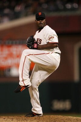 SAN FRANCISCO - APRIL 4:  Armando Benitez #49 of the San Francisco Giants pitches against the San Diego Padres on April 4, 2007 at AT&T Park in San Francisco. The Padres won 5-3. (Photo by Jed Jacobsohn/Getty Images)