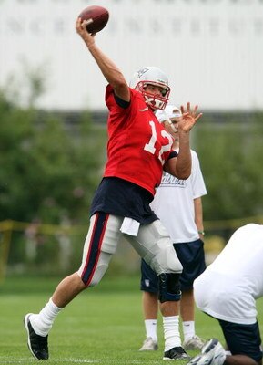 FOXBORO, MA - JULY 31:  Quarterback Tom Brady #12 of the New England Patriots passes the ball during training camp on July 31, 2009 at Gillette Stadium in Foxboro, Massachusetts.  (Photo by Elsa/Getty Images)