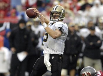 TAMPA, FL - NOVEMBER 30: Quarterback Drew Brees #9 of the New Orleans Saints sets to pass against the Tampa Bay Buccaneers at Raymond James Stadium on November 30, 2008 in Tampa, Florida.  (Photo by Al Messerschmidt/Getty Images) 