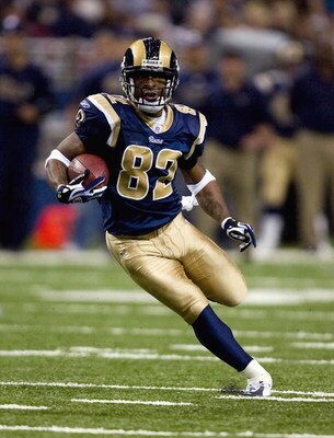 ST. LOUIS - NOVEMBER 25: Dante Hall #82 of the St. Louis Rams carries the ball against the Seattle Seahawks at the Edward Jones Dome November 25, 2007 in St. Louis, Missouri. The Seahawks defeated the Rams 24-19. (Photo by Dilip Vishwanat/Getty Images) 