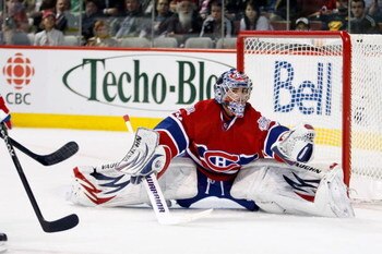 MONTREAL- APRIL 22:  Carey Price #31 of the Montreal Canadiens stretches out to make a glove save during Game Four of the Eastern Conference Quarterfinals of the 2009 Stanley Cup Playoffs against the Boston Bruins at the Bell Centre on April 22, 2009 in M