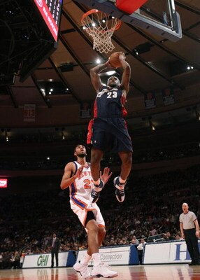 NEW YORK - MARCH 05:  LeBron James #23 of the Cleveland Cavaliers looks to dunk against Jared Jeffries #20 of the New York Knicks during their game on March 5, 2008 at Madison Square Garden in New York City.   NOTE TO USER: User expressly acknowledges and