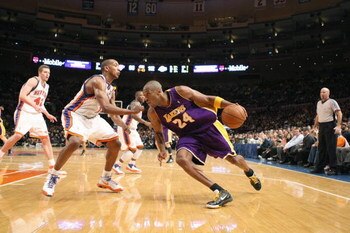 NEW YORK - FEBRUARY 2: Kobe Bryant #24 of the Los Angeles Lakers drives the ball against the New York Knicks on February 2, 2009 at Madison Square Garden in New York City. NOTE TO USER: User expressly acknowledges and agrees that, by downloading and or us