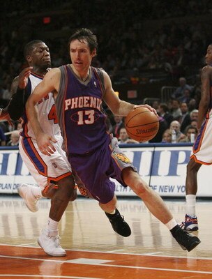 NEW YORK - JANUARY 24:  Steve Nash #13 of the Phoenix Suns drives against Nate Robinson #4 of the New York Knicks January 24, 2007 at Madison Square Garden in New York City. NOTE TO USER: User expressly acknowledges and agrees that, by downloading and or 