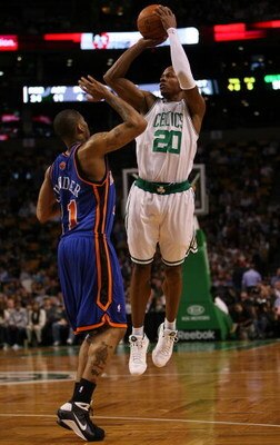 BOSTON - NOVEMBER 18:  Ray Allen #20 of the Boston Celtics takes a shot as Wilson Chandler #21 of the New York Knicks defends on November 18,  2008 at TD Banknorth Garden in Boston, Massachusetts. NOTE TO USER: User expressly acknowledges and agrees that,