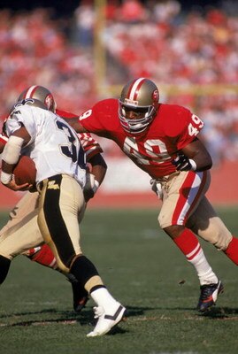 SAN FRANCISCO - DECEMBER 11:  Defensive back Jeff Fuller #49 of the San Francisco 49ers goes after the New Orleans Saints ball carrier during a game at Candlestick Park on December 11, 1988 in San Francisco, California.  The 49ers won 30-17.  (Photo by Ge