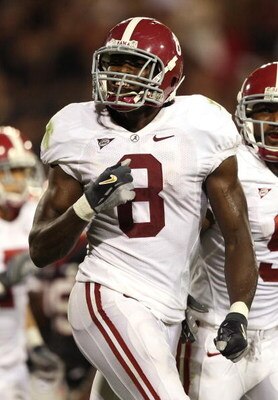 ATHENS, GA - SEPTEMBER 27:  Wide receiver Julio Jones #8 of the Alabama Crimson Tide celebrates his touchdown catch in the second quarter against the Georgia Bulldogs at Sanford Stadium on September 27, 2008 in Athens, Georgia. Alabama defeated Georgia 41