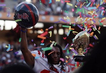 DALLAS - JANUARY 02:  Dexter McCluster #22 of the Mississippi Rebels celebrates a 47-34 win against the Texas Tech Red Raiders during the AT&T Cotton Bowl on January 2, 2009 at the Cotton Bowl in Dallas, Texas.  (Photo by Ronald Martinez/Getty Images)