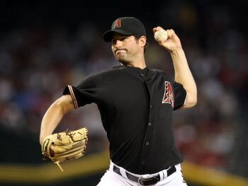 PHOENIX - MAY 30:  Starting pitcher Doug Davis #49 of the Arizona Diamondbacks pitches against the Atlanta Braves during the major league baseball game at Chase Field on May 30, 2009 in Phoenix, Arizona. The Diamondbacks defeated the Braves 3-2.  (Photo b