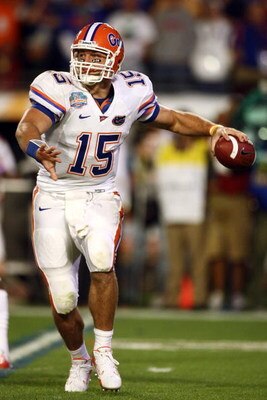 MIAMI - JANUARY 08:  Quarterback Tim Tebow #15 of the Florida Gators looks to pass against the Oklahoma Sooners in the FedEx BCS National Championship Game at Dolphin Stadium on January 8, 2009 in Miami, Florida.  (Photo by Donald Miralle/Getty Images)