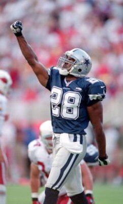 10 Sep 2000: Darren Woodson #28 of the Dallas Cowboys celebrates as he walkd on the field during a game against the Arizona Cardinals at the Sun Devil Stadium in Tempe, Arizona.  The Cardinals defeated the Cowboys 32-31.Mandatory Credit: Harry How  /Allsp