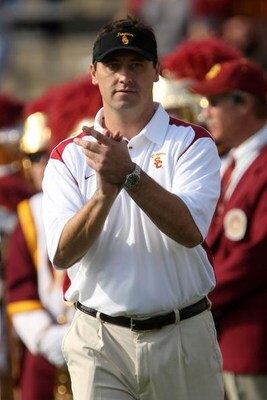 PASADENA, CA - DECEMBER 06:  Offensive coordinator Steve Sarkisian of the USC Trojans watches warm ups before the game against the UCLA Bruins on December 6, 2008 at the Rose Bowl in Pasadena, California.  (Photo by Stephen Dunn/Getty Images)