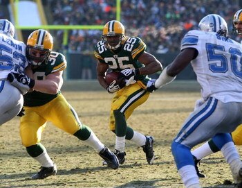 GREEN BAY, WI - DECEMBER 28: Ryan Grant #25 of the Green Bay Packers looks for running room against the Detroit Lions on December 28, 2008 at Lambeau Field in Green Bay, Wisconsin. The Packers defeated the Lions 31-21. (Photo by Jonathan Daniel/Getty Imag