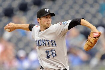 KANSAS CITY, MO - APRIL 30:  Bryan Bullington #36 of the Toronto Blue Jays throws a pitch against the Kansas City Royals on April 30, 2009 at Kauffman Stadium in Kansas City, Missouri. (Photo by G. Newman Lowrance/Getty Images)