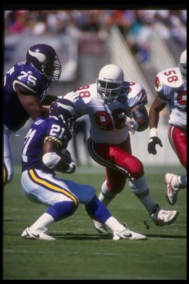 3 Oct 1994: Defensive lineman Eric Swann of the Arizona Cardinals works against the Minnesota Vikings during a game at Sun Devil Stadium in Tempe, Arizona. The Cardinals won the game, 17-7.