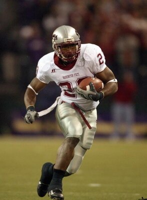 SEATTLE - NOVEMBER 24: Kevin McCall #20 of the Washington State Cougars carries the ball during the 100th Apple Cup Game against the Washington Huskies at Husky Stadium on November 24, 2007 in Seattle, Washington. (Photo by Otto Greule Jr/Getty Images)