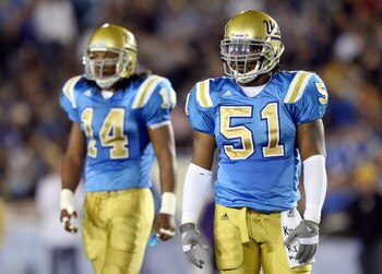 PASADENA, CA - SEPTEMBER 22:   Reggie Carter #51 of the UCLA Bruins looks on during the game against the Washington Huskies at the Pasadena Rose Bowl on September 22, 2007 in Pasadena, California.  (Photo by Lisa Blumenfeld/Getty Images)