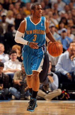 DENVER - APRIL 19:  Chris Paul #3 of the New Orleans Hornets controls the ball against the Denver Nuggets in Game One of the Western Conference Quarterfinals during the 2009 NBA Playoffs at Pepsi Center on April 19, 2009 in Denver, Colorado. The Nuggets d