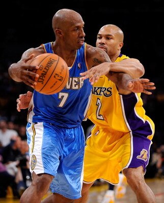 LOS ANGELES, CA - MAY 21:  Chauncey Billups #7 of the Denver Nuggets moves the ball as he is guarded by Derek Fisher #2 of the Los Angeles Lakers in Game Two of the Western Conference Finals during the 2009 NBA Playoffs at Staples Center on May 21, 2009 i
