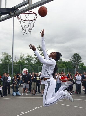 BURNABY, CANADA - JULY 13: In this photo provided by EA Sports, Tennis star Venus Williams makes a layup during the EA Sports King of the Court competition July 13, 2009 in Burnaby, Canada.  Dwight Howard and Venus Williams participated in the 'Play with 