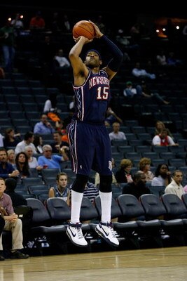 CHARLOTTE, NC - OCTOBER 15:  Vince Carter #15 of the New Jersey Nets shoots during the game against the Charlotte Bobcats at Charlotte Bobcats Arena on October 15, 2007 in Charlotte, North Carolina.  The Bobcats won 96-86.  NOTE TO USER: User expressly ac