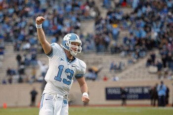 DURHAM, NC - NOVEMBER 29:  Quarterback T.J. Yates #13 of the North Carolina Tar Heels celebrates on the field during the game against the Duke Blue Devils at Wallace Wade Stadium on November 29, 2008 in Durham, North Carolina. (Photo by Kevin C. Cox/Getty