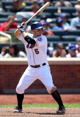 NEW YORK - JULY 12:  David Wright #5 of the New York Mets bats against the Cincinnati Reds on July 12, 2009 at Citi Field in the Flushing neighborhood of the Queens borough of New York City.  (Photo by Jim McIsaac/Getty Images)