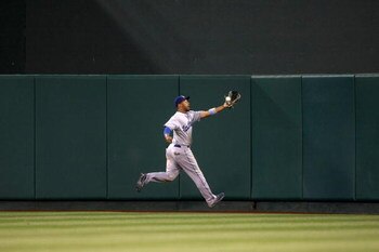 ANAHEIM, CA - JUNE 21:  Center fielder Matt Kemp #27 of the Los Angeles Dodgers  chases a fly ball against the Los Angeles Angels of Anaheim on June 21, 2009 at Angel Stadium in Anaheim, California.   The Dodgers won 5-3. (Photo by Stephen Dunn/Getty Imag