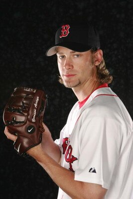 FORT MYERS, FL - FEBRUARY 26:  Bronson Arroyo #61 of the Boston Red Sox poses for a portrait during the Boston Red Sox Photo Day at the Red Sox spring training complex on February 26, 2006 in Fort Myers, Florida. (Photo by Nick Laham/Getty Images) 