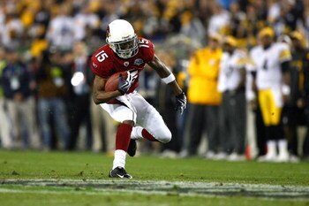 TAMPA, FL - FEBRUARY 01:  Wide receiver Steve Breaston #15 of the Arizona Cardinals runs for yards after the catch against the Pittsburgh Steelers during Super Bowl XLIII on February 1, 2009 at Raymond James Stadium in Tampa, Florida. Steelers won 27-23. 