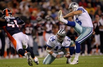DENVER - AUGUST 16:  Kicker Nick Folk #6 of the Dallas Cowboys kicks kicks a field goal from the hold of Brad Johnson #14 against the Denver Broncos during preseason NFL action at Invesco Field at Mile High on August 16, 2008 in Denver, Colorado. The Bron
