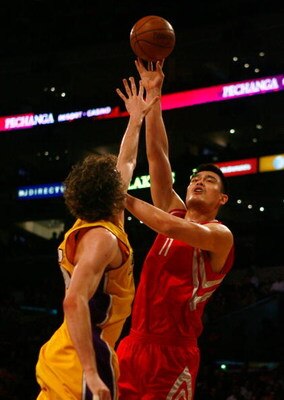 LOS ANGELES, CA - APRIL 03:  Yao Ming #11 of the Houston Rockets shoots over Pau Gasol #16 of the Los Angeles Lakers during the first half at Staples Center on April 3, 2009 in Los Angeles, California. NOTE TO USER: User expressly acknowledges and agrees 