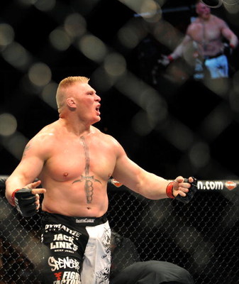 LAS VEGAS - JULY 11: Brock Lesnar reacts after knocking out Frank Mir during their heavyweight title bout during UFC 100 on July 11, 2009 in Las Vegas, Nevada. (Photo by Jon Kopaloff/Getty Images)