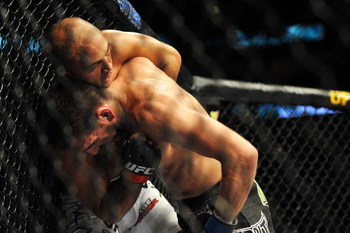 PHILADELPHIA - AUGUST 08: (L-R) Lightweight champion BJ Penn battles Kenny Florian during their lightweight championship title bout at UFC 101: Declaration at the Wachovia Center on August 8, 2009 in Philadelphia, Pennsylvania. (Photo by Jon Kopaloff/Ge
