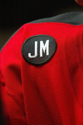 EAST RUTHERFORD, NJ - FEBRUARY 11:  A patch with the initials JM honors former New Jersey Devils owner John McMullen during their game against the New York Islanders on February 11, 2006 at the Continental Airlines Arena in East Rutherford, New Jersey. (P