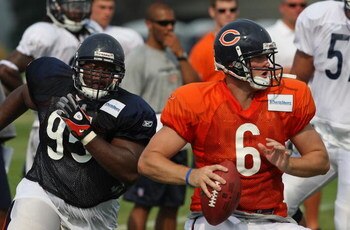 BOURBONNAIS, IL - AUGUST 04: Three Chicago Bears helmuts rest on the field during a training camp practice on August 4, 2009 at Olivet Nazarene University in Bourbonnais, Illinois. (Photo by Jonathan Daniel/Getty Images)
