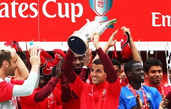 LONDON, ENGLAND - AUGUST 02:  Arsenal  captain Cesc Fabregas lifts the Trophy following his team's victory during the Emirates Cup match between Arsenal and Glasgow Rangers at the Emirates Stadium on August 2, 2009 in London, England.  (Photo by Phil Cole