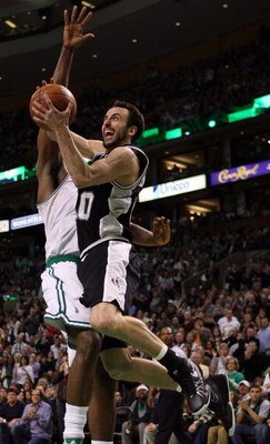 BOSTON - FEBRUARY 08:  Manu Ginobili #20 of San Antonio Spurs goes up for two as Kendrick Perkins  #43 of the Boston Celtics on February 8, 2009 at TD Banknorth Garden in Boston, Massachusetts. The Spurs defeated the Celtics 105-99. NOTE TO USER: User exp