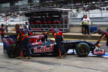 NURBURG, GERMANY - JULY 11: Sebastien Bourdais of France and Scuderia Toro Rosso is pushed back into his garage during qualifying for the German Formula One Grand Prix at Nurburgring on July 11, 2009 in Nurburg, Germany. (Photo by Mark Thompson/Getty Im