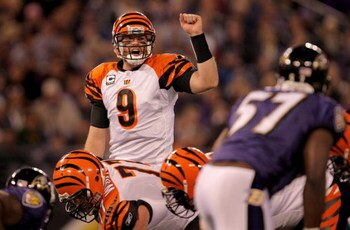 BALTIMORE - NOVEMBER 11:  Quarterback Carson Palmer #9 of the Cincinnati Bengals runs the offense against the Baltimore Ravens at M&T Bank Staduim on November 11, 2007 in Baltimore, Maryland. Cincinnati defeated Baltimore 21-7.  (Photo by Doug Pensinger/G