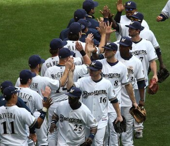 MILWAUKEE - MAY 14: Members of the Milwaukee Brewers including Mike Cameron #25, Chris Duffy #16, Ryan Braun #8 and Rickie Weeks #23 celebrate a win over the Florida Marlins on May 14, 2009 at Miller Park in Milwaukee, Wisconsin. The Brewers defeated the 