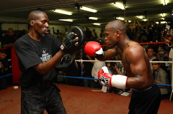 LONDON, ENGLAND - MAY 22:  Boxing superstar Floyd Mayweather in his first open workout since coming out of retirement with trainer and uncle Roger Mayweather, as he prepares for his fight against Juan Manuel Marquez of Mexico, at Peacock Gym on May 22, 20