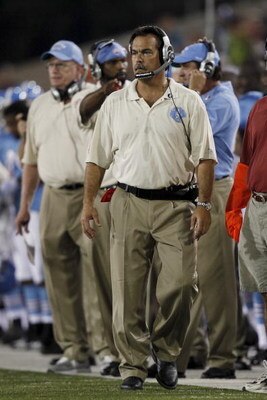 CANTON, OH - AUGUST 9:  Head coach Jeff Fisher of the Tennessee Titans looks on against the Buffalo Bills during the Pro Football Hall of Fame Game at Fawcett Stadium on August 9, 2009 in Canton, Ohio. (Photo by Joe Robbins/Getty Images)